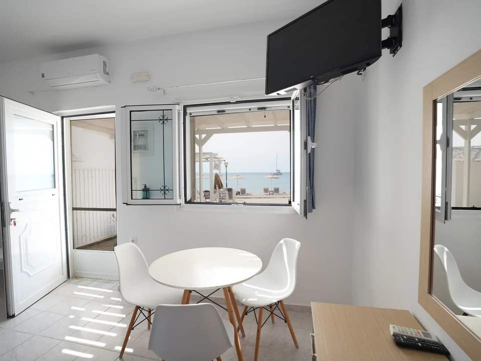 The studio with open windows looking straight out to the sea